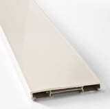 Close-up of smooth, white kitchen cabinet plinth showing its sleek, modern design with precise edges.