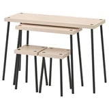 Set of 2 light beige nesting tables and stools with black metal legs. Modern, minimalist design with smooth surfaces and angled legs for stability.