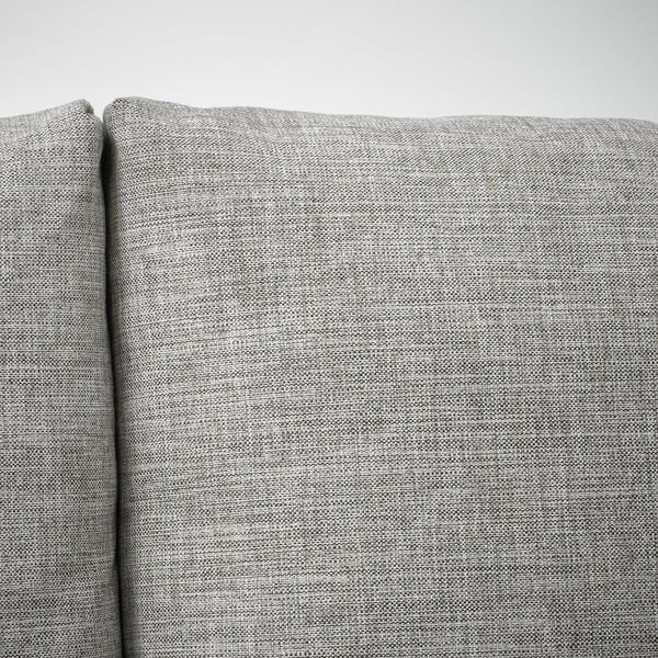Close-up of FRIHETEN sofas high-quality, textured gray fabric.