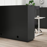 Black office cabinet with combination lock, adjustable feet, and silent-closing doors.