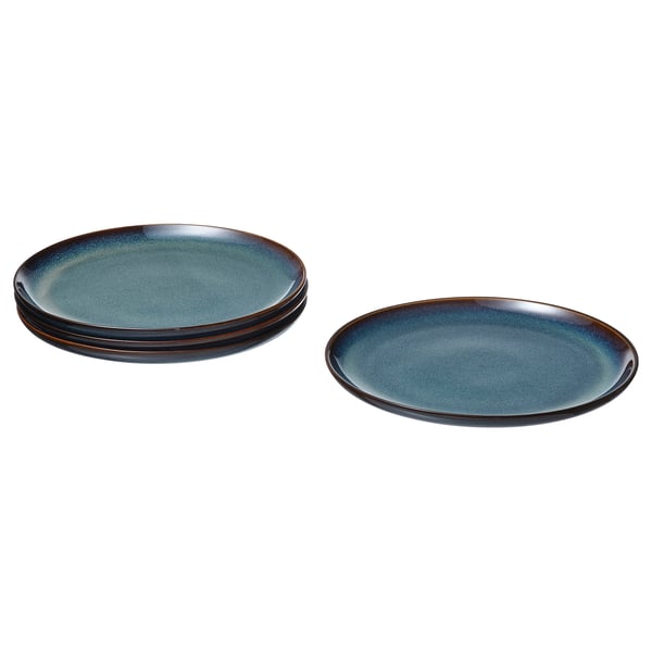 Two blue, round, glazed ceramic plates stacked neatly, showcasing golden-brown details and a sleek, modern design.