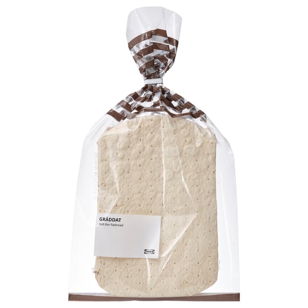 A packaged loaf of GRÄDDAT soft thin flatbread, sealed in clear plastic with a label.
