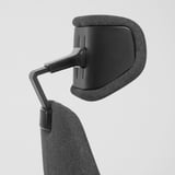 Ergonomic gaming chair backrest and armrest, adjustable for comfort.