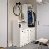 White HAUGA storage with mirrors and hooks. Cactus decor.
