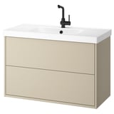 Beige wall-mounted bathroom cabinet with white sink and black faucet, minimalist design.