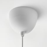 White ceiling-mounted lamp with rounded shade, adjustable cord, and blanched background.