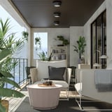 Modern outdoor patio with white HAVSTEN sofa, pink table, plants, and grey cushions.