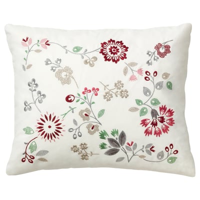 Rectangular pillow with white base, embroidered floral designs in red, green, beige. Plush with duck feathers.