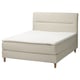 Modern beige bed with soft head and wooden legs, contemporary design.