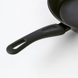 Non-stick frying pan handle with grip; durable, even heat distribution.
