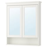 White HEMNES mirror cabinet with adjustable shelf, sleek design.
