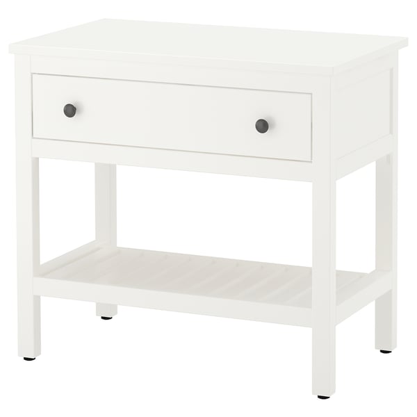 A white wooden HEMNES nightstand with a single drawer and an open shelf, featuring stylish round knobs.