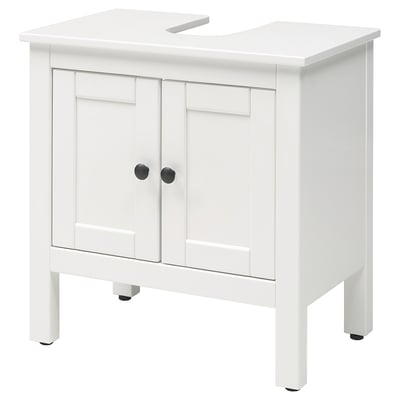 Ikea HEMNES white under sink cabinet, rectangular shape, two doors with black knobs.