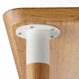 White metal base bolted to curved bamboo table edge. Showcasing quality craftsmanship.