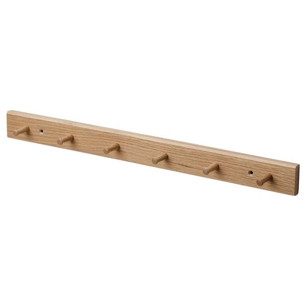 A light brown wooden HÖVOLM coat rack with six knobs for hanging items, featuring a minimalist and simple design.