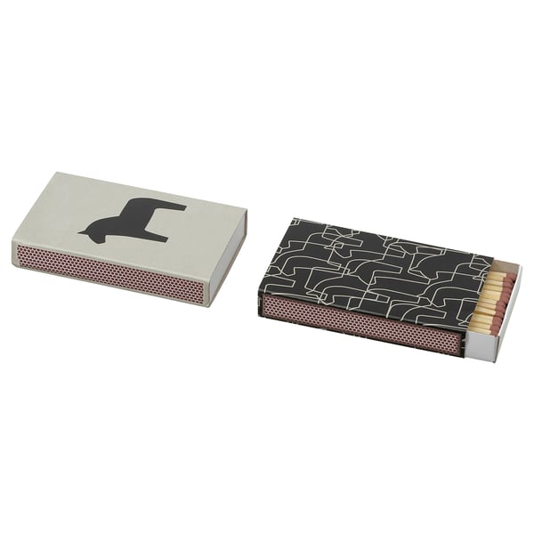 HYLTA matches: one box with black dala horse, other with black-white folk art.