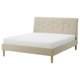 IDANÄS bed: cream, fabric, rectangular, tufted headboard, wooden legs.