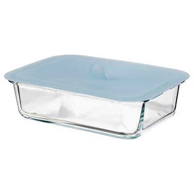 A clear glass food container with a blue lid by IKEA 365+, rectangular shape, oven-safe, with a vacuum-sealed lid for food storage.