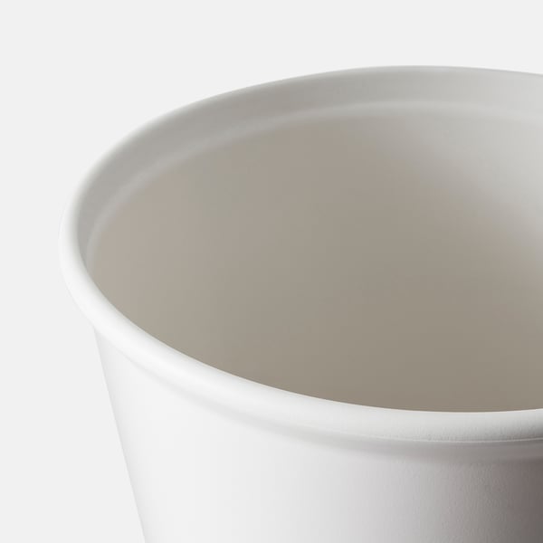 Close-up of white ikea self-watering plant pots smooth, seamless design.