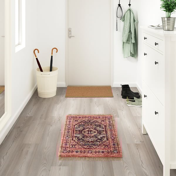 ISGRÄS red wool rug, rectangular, patterned, fits under white furniture, small in size.