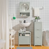 Modern bathroom with IVÖSJÖN light gray vanity, round mirror, white sink, sliding doors, small shelves, and potted plant.
