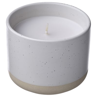 JÄMLIK candle: white ceramic, speckled, cylindrical with vanilla scent.