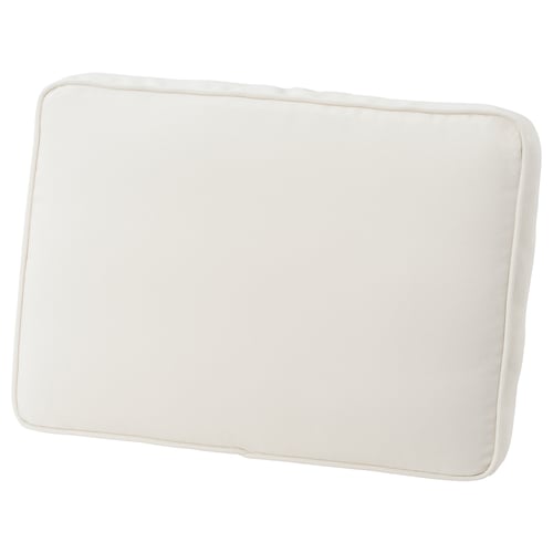 The JÄRPÖN cushion cover is cream-colored, rectangular with rounded edges, and a simple, elegant design.