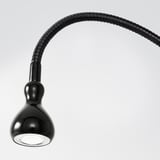 Modern, sleek black lamp with adjustable gooseneck & focused light.