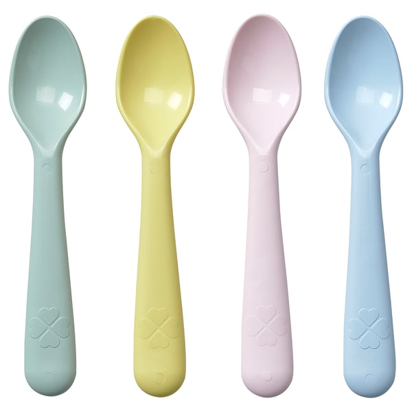 Four colored spoons with textured grips and heart emblems.