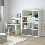 KALLAX toy/book storage with shelves, drawers, and desk.