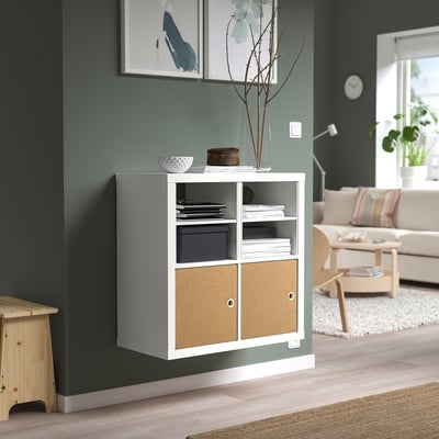 KALLAX shelving unit: white and cork storage, modern & natural, open & closed compartments, living room.
