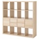 KALLAX light oak bookshelf multiple squares for storage, with four drawers and easy access compartments. Modern design offers versatile organization.