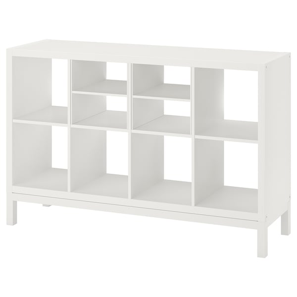 White ikea KALLAX shelving unit for storage. Minimalist design with cubes and steel frame.