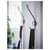 Wall hooks with labels, aluminum finish, holding red and black items.