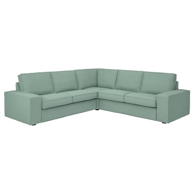KIVIK corner sofa: light green, modern design with low armrests, plush cushions for comfort.
