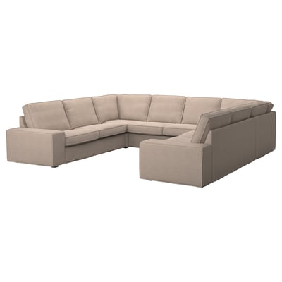 An l-shaped KIVIK beige sofa with low armrests and plush cushions, designed for comfort and relaxation.