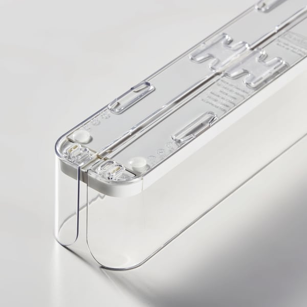 Transparent plastic drink holder, quality design with adjustable sides, neatly organizes cans/bottles.