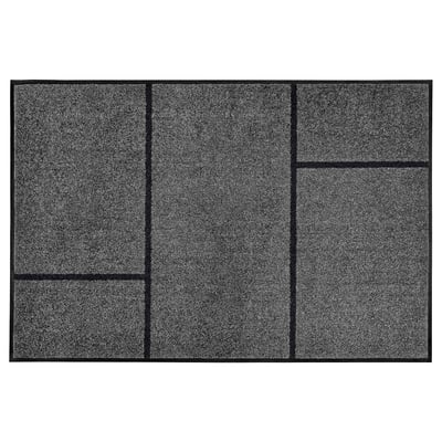 Black rectangular KÖGE mat, grid design, recycled polyester and nylon, durable for heavy traffic hallways.