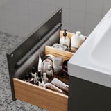 Drawer with organized cosmetics and toiletries