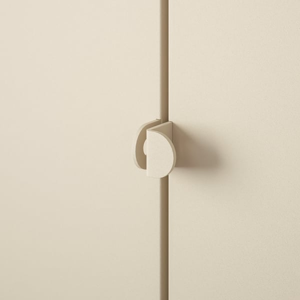 Minimalist door with sleek, modern handle. Off-white color, smooth finish.