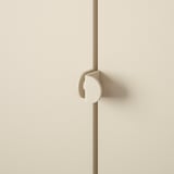 Minimalist door with sleek, modern handle. Off-white color, smooth finish.
