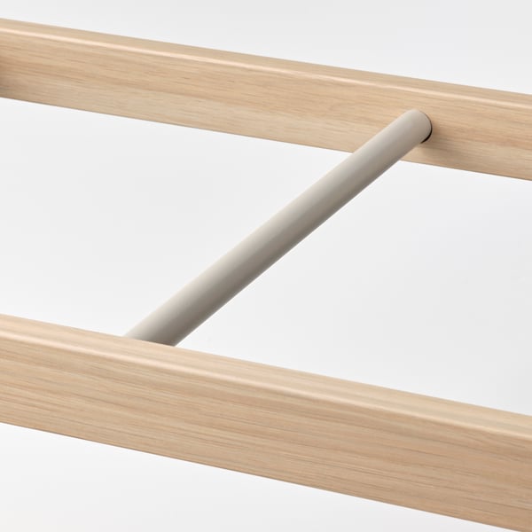 Modern wooden clothes rail detail, showcasing high-quality finish & sturdy design.