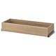 An empty wooden drawer from the KOMPLEMENT series, ideal for organizing clothes and accessories, with a sleek natural finish.