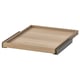 An ikea KOMPLEMENT pull-out tray. Its light brown, rectangular, with wooden texture and metallic runners. Ideal for wardrobe storage.