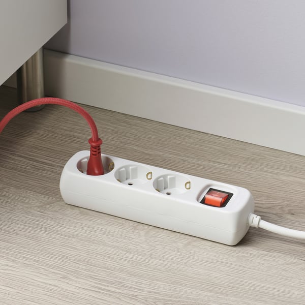 White extension socket with 3 outlets and a red power switch, providing additional power options.
