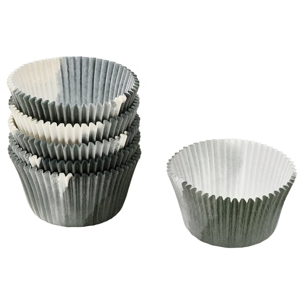 Two stacks of gray and white bakeware cupcake liners, made from bleached chlorine-free paper with silicone treatment, ruffled design.
