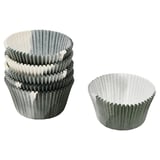 Two stacks of gray and white bakeware cupcake liners, made from bleached chlorine-free paper with silicone treatment, ruffled design.