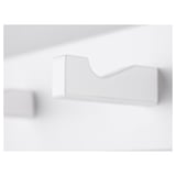 Minimalist white wall rack, mounted securely, ideal for organizing small items.