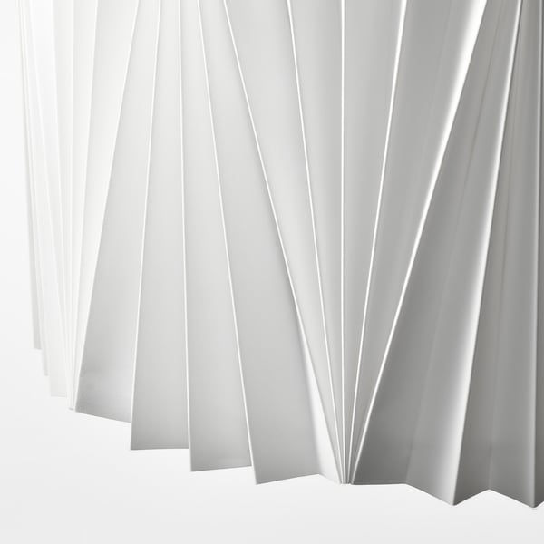 Modern pleated lampshade, crisp white, sleek design.