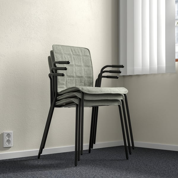 Stacked LÄKTARE conference chairs, light grey fabric, black metal frame, armrests visible, suitable for office or meeting spaces.